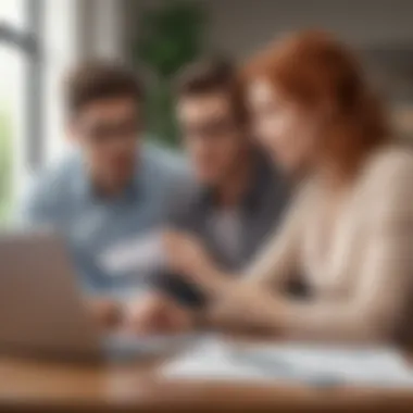 A couple discussing financial goals with a laptop